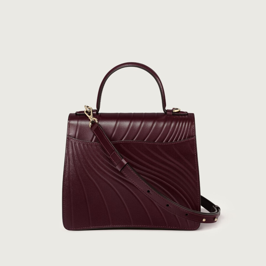 small model handle bag panthère c de cartier