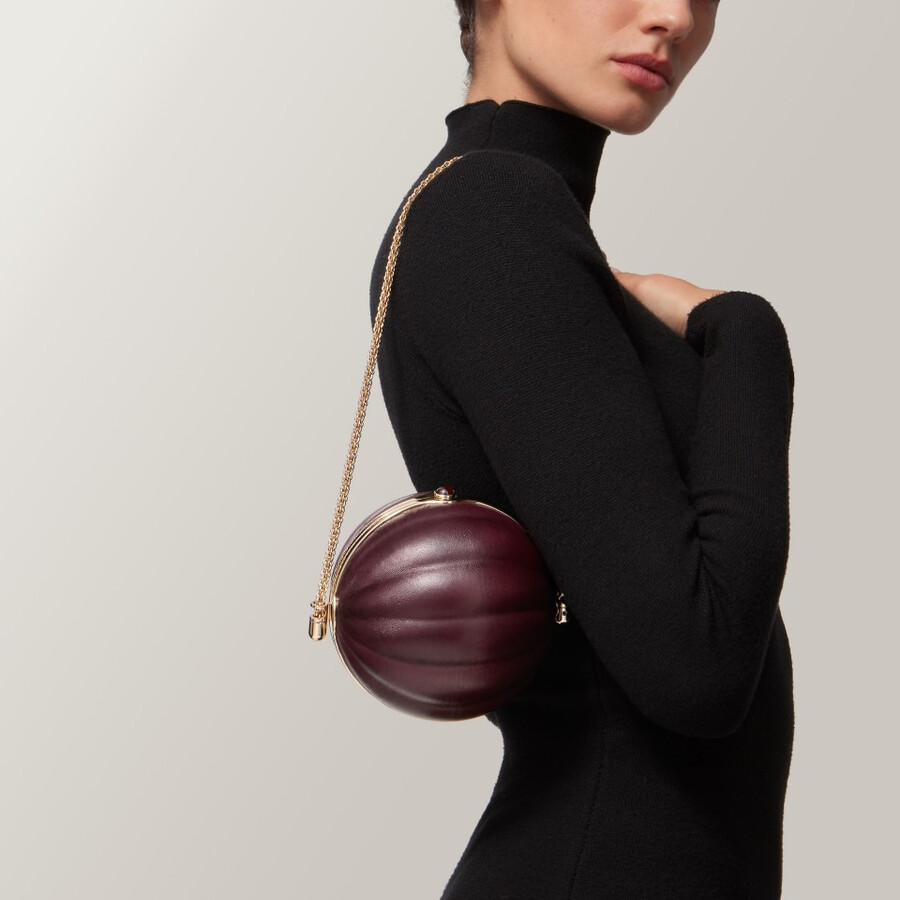 round bag with gadroon motif cartier soir
