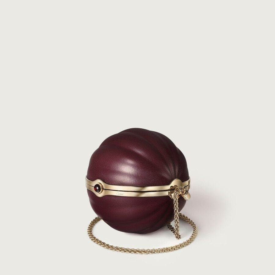 round bag with gadroon motif cartier soir