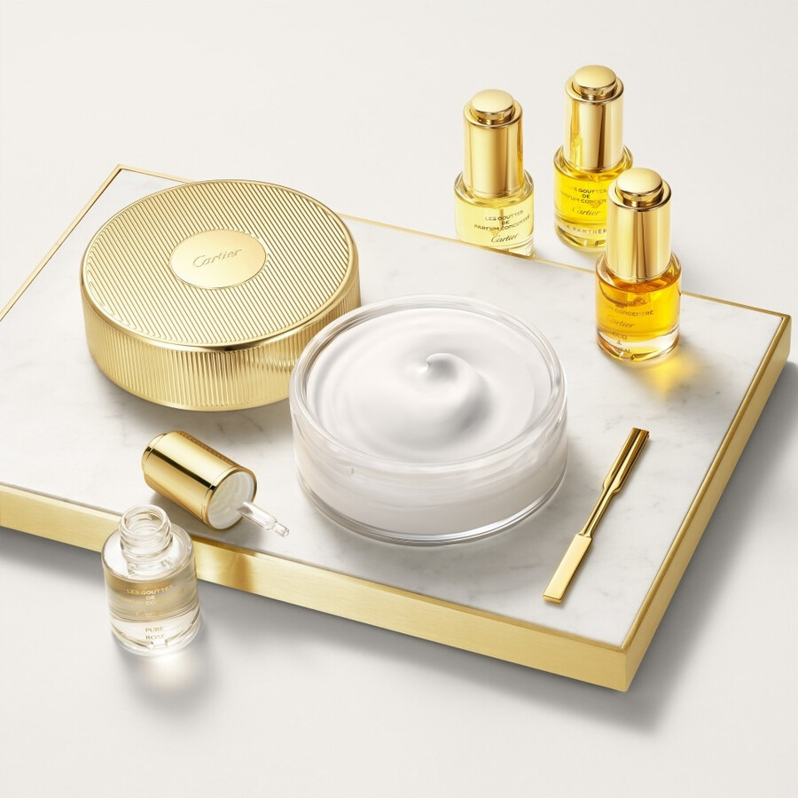 les gouttes de parfum concentré cartier - oud santal