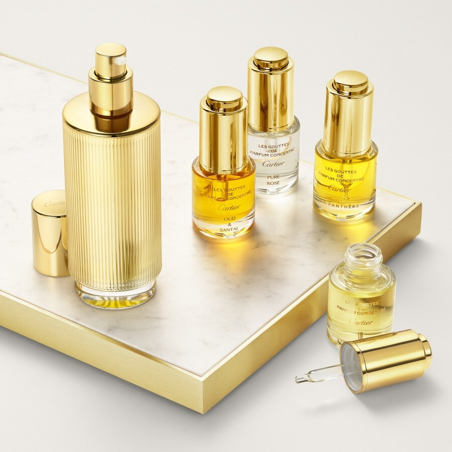 les gouttes de parfum concentré cartier - oud santal