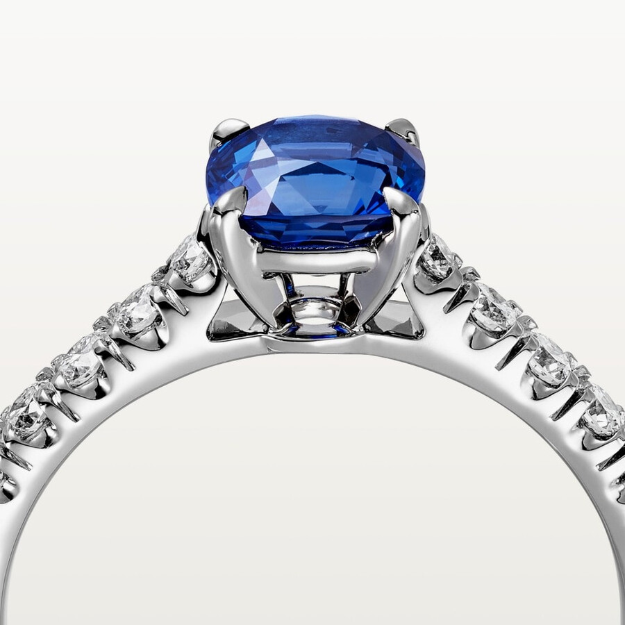 1895 solitaire cushion-cut sapphire paved