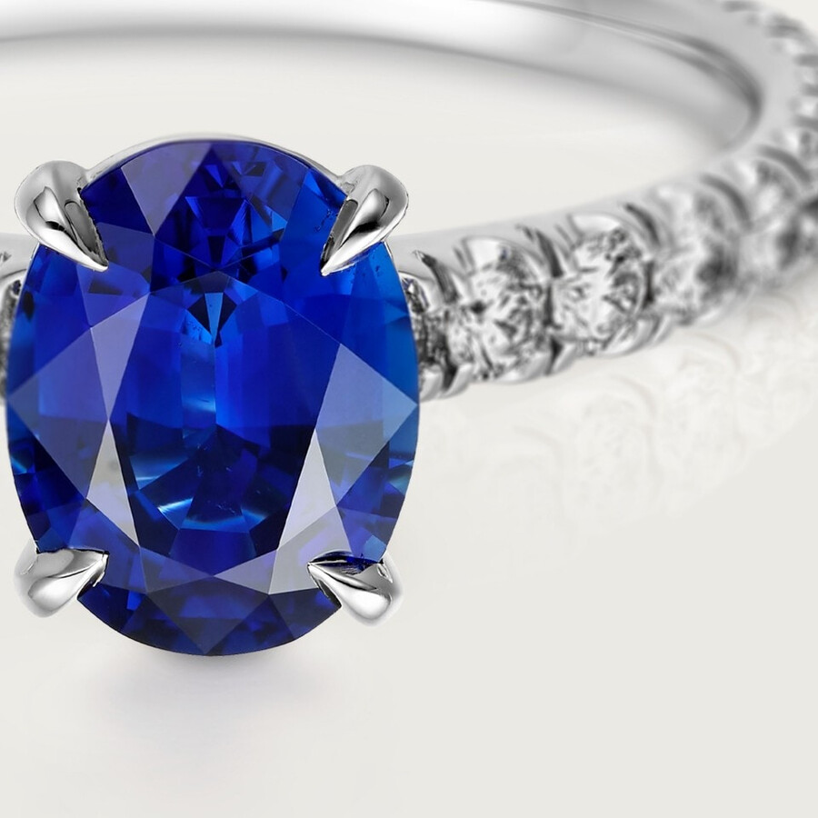 1895 solitaire oval-cut sapphire paved