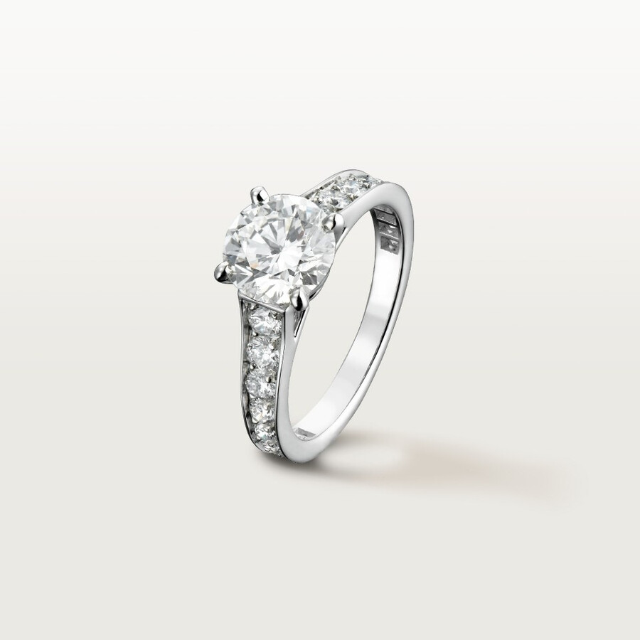 1895 solitaire brilliant-cut diamond paved