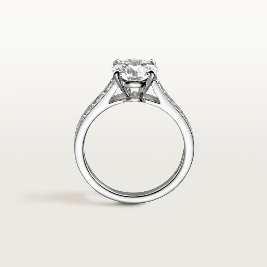 1895 solitaire brilliant-cut diamond paved
