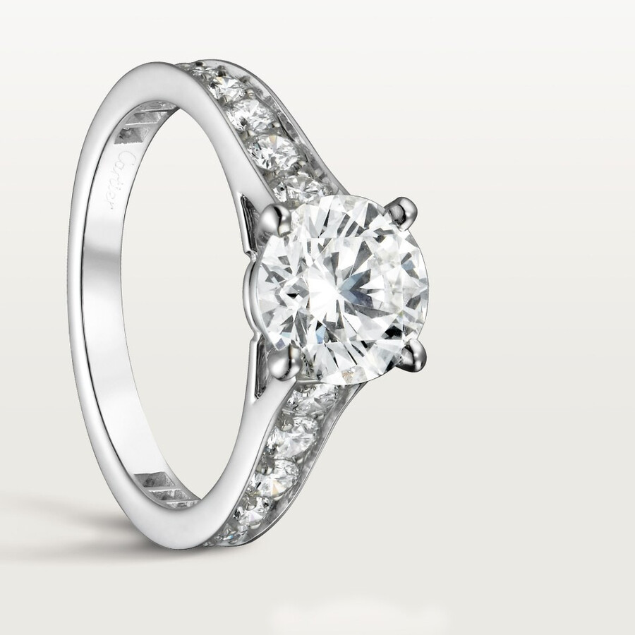 1895 solitaire brilliant-cut diamond paved