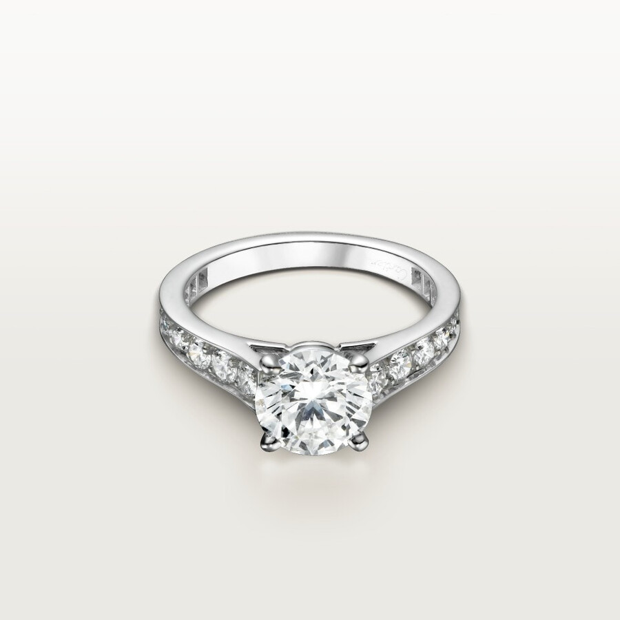 1895 solitaire brilliant-cut diamond paved