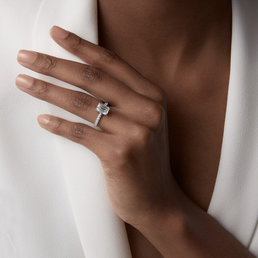 1895 solitaire emerald-cut diamond paved