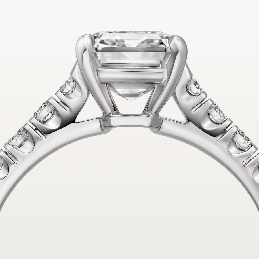 1895 solitaire emerald-cut diamond paved
