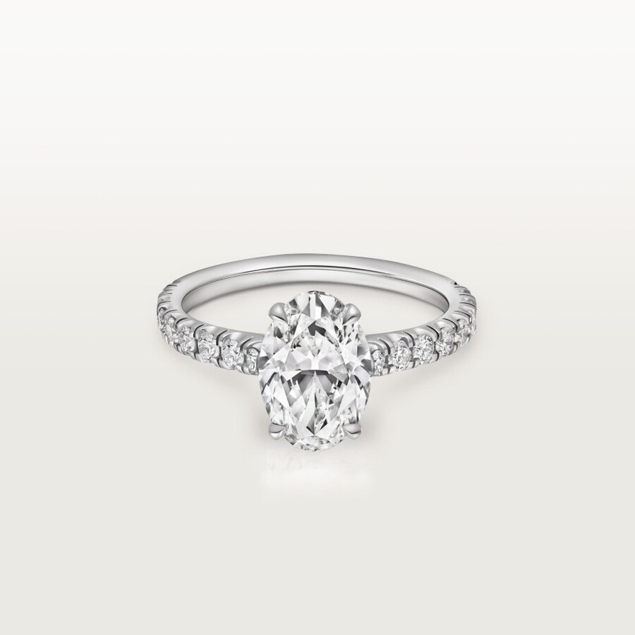 1895 solitaire oval-cut diamond paved