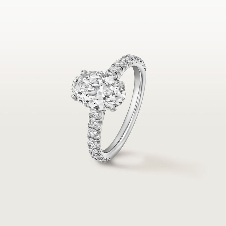 1895 solitaire oval-cut diamond paved