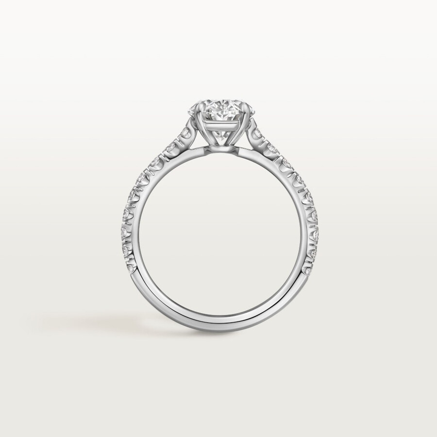 1895 solitaire oval-cut diamond paved