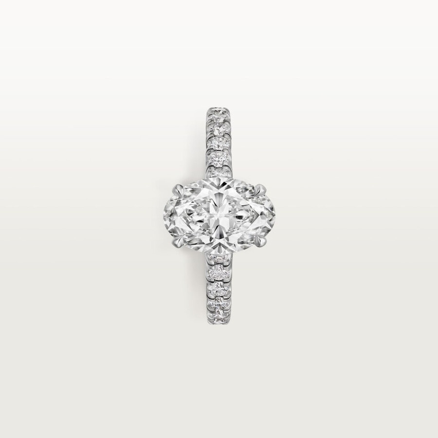 1895 solitaire oval-cut diamond paved