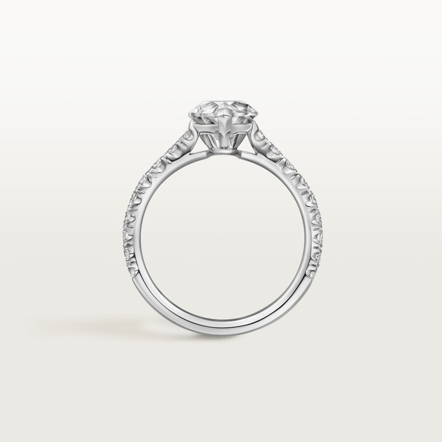 1895 solitaire pear-shaped diamond paved