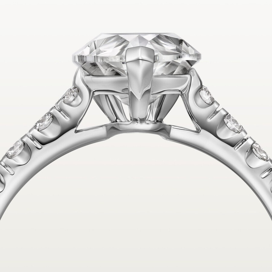 1895 solitaire pear-shaped diamond paved