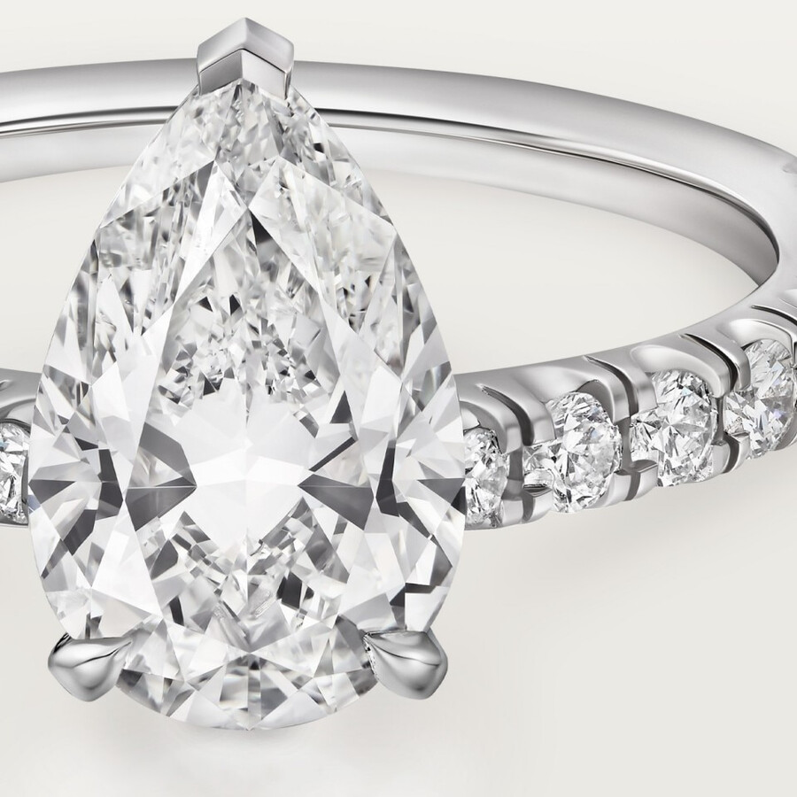 1895 solitaire pear-shaped diamond paved